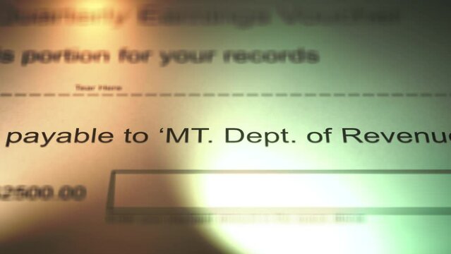 Camera Slides over Payment Voucher to the Montana Department of Revenue