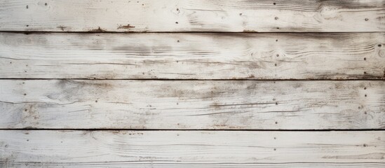 Fototapeta na wymiar A detailed view of an old white wooden wall, showcasing the texture and color variations of the weathered wood planks up close.