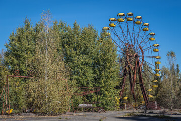 Ferris wheel in amusement park in Pripyat ghost city in Chernobyl Exclusion Zone in Ukraine