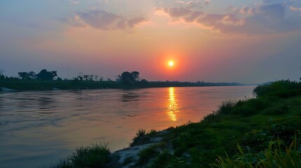 Fototapeta na wymiar sun set at the bank of river,