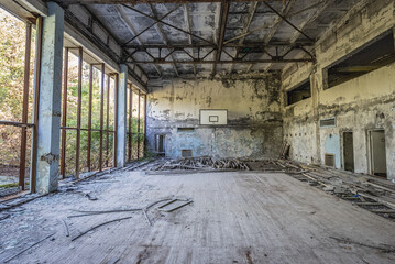Basketball court in building of Azure Swimming Pool in Pripyat ghost city in Chernobyl Exclusion...