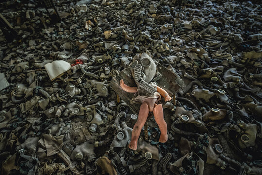 Doll with gas mask in Middle School No. 3 in Pripyat ghost city in Chernobyl Exclusion Zone, Ukraine
