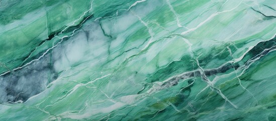 A close-up view of a vibrant green marble texture against a clean white background, showcasing intricate swirls and patterns.