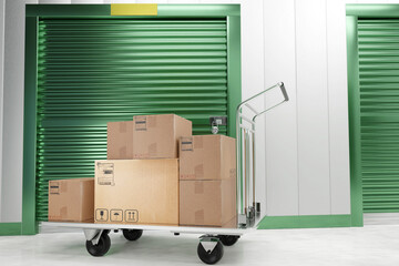 Storage Units. Self storage unit cutaway. Boxes on the cart. cardboard boxes. 3d image