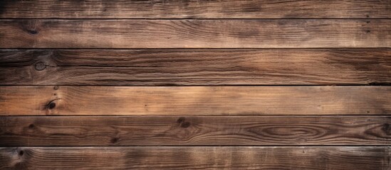 Obraz na płótnie Canvas A high-resolution wooden wall constructed using a pattern of wooden planks. The planks are arranged closely together, creating a textured background.