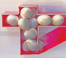 Eggs with golden light to celebrate Happy Easter