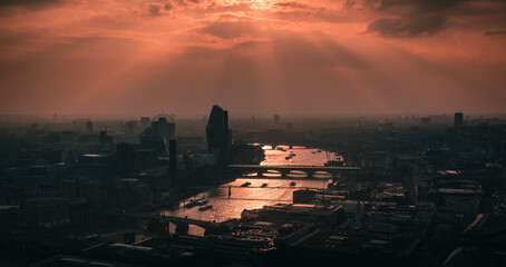 London, England:  London Bridges and city skyline at sunset  