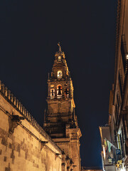 Iconic Tower and Bell Tower of the Mezquita-Catedral, mosque cathedral in Cordoba during night