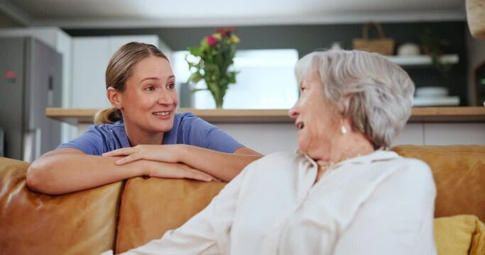 Healthcare, smile and nurse chatting to old woman on sofa in living room of home for consulting or help. Medical, conversation and happy caregiver with senior patient in retirement apartment