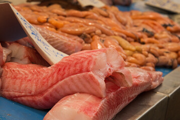 fish market with many different fresh fishes