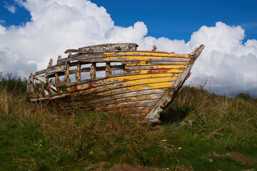 Ireland, 'The Wild Atlantic Way' - an old boat on the river. Irish travel and tourism.