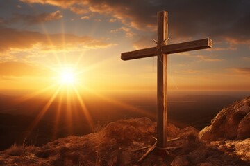 Cross on the top of the mountain at sunrise