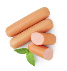 Whole and cut delicious boiled sausages with basil on white background, top view