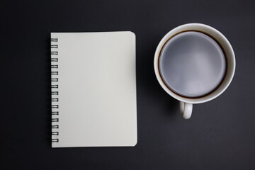 cup of coffee with notebook