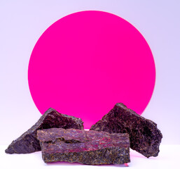 black stones on the background of a pink circle for the podium - 754625790