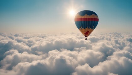 Fototapeta premium Hot air balloon rises very high in blue sky above white clouds bright sun shines