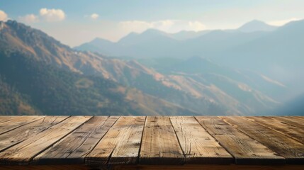 Naklejka na ściany i meble Wooden table top with copy space. Mountains background