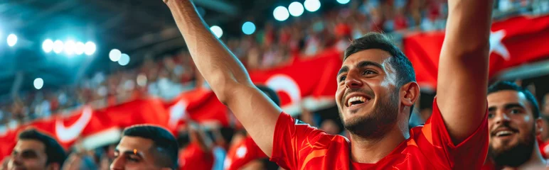Fotobehang Turkish football soccer fans in a stadium supporting the national team, Ay-Yildizlilar  © Pixelmagic