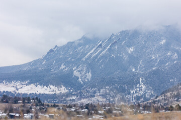Fototapeta na wymiar Landscape of Boulder Colorado, Flatirons, Snow, Fog