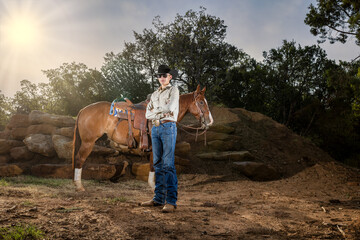 Young cowboy wearing sunglasses posing with his Quarter horse portraits
