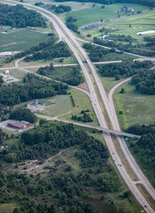 aerial view of highway in farm landscaping
