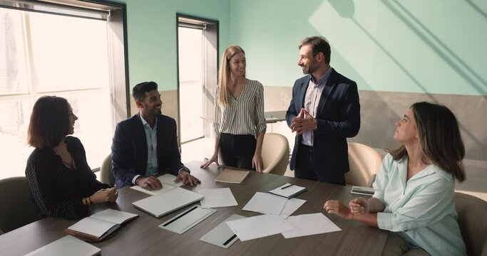 Team stack palms together showing unity and collaboration, succeed common goal, supporting, feel happy with teamwork. Give high five, sign of celebration and acknowledgment of achievement. Team spirit