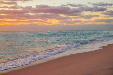Beautiful clouds over the sea. Sunrise with clouds of different colors against the sky and sea.
