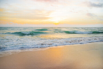 Sunrise over the ocean, water surface in slow motion during sunrise, static shot of nature...