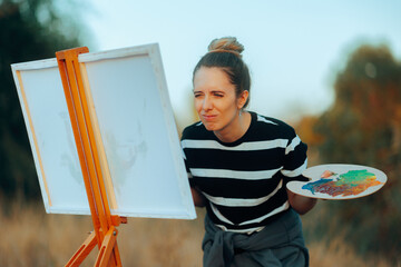 Woman Squinting Not Seeing to paint without her Eyeglasses. Confused painter unable to see from a...