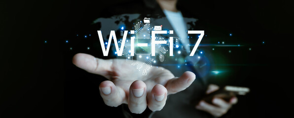 Businessman is showing concept of future technology and internet connection network with AI as controller. A graphic floated in the air on his hand. Data center network concept.