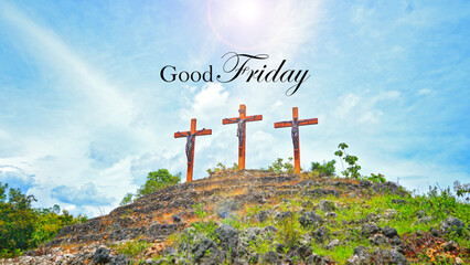 Good Friday concept with text on the background of blue sky cloud and Three crosses of Jesus Christ on top of the hill. Holy week of Easter. Christianity backgrounds.