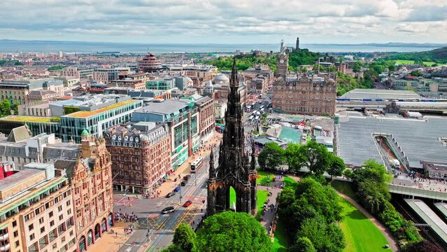 Aerial view of Spirelike Victorian Scott Monument in Edinburgh, Scotland. Gothic monument built in honour of the Scottish writer, 200 feet Tower in Princess Street Gardens, Edinburgh, Scotland.