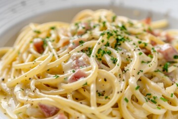 A close-up of a plate of spaghetti carbonara, a classic Italian dish.
