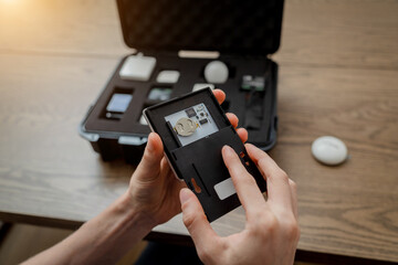 A technician works with a demo kit of the smart home system