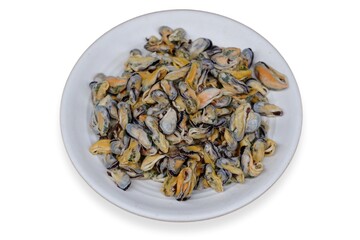 Fresh asian green mussel (Perna viridis) meat on a white plate over white background. Clams on the serving plate. Rustic style. Banner with space for text