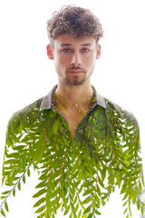 A double exposure male portrait merged with green leaves at the bottom - 754691794