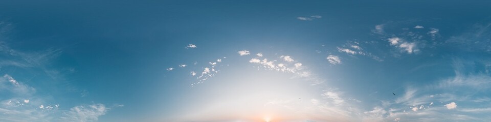 Bright sunset sky panorama with Cirrus clouds. Seamless hdr spherical 360 panorama. Sky dome or zenith for 3D visualization, game and sky replacement for aerial drone 360 panoramas.