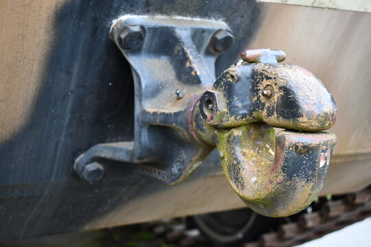 Pintle hook, black and tan cammo pattern.