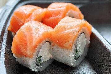 Sushi, rolls of Japanese cuisine. Close-up, selective focus.