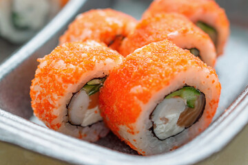 Sushi Japanese cuisine. Close-up, selective focus. Food delivery concept.
