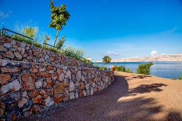Texture of a fence in macro made of natural stone in the mountains