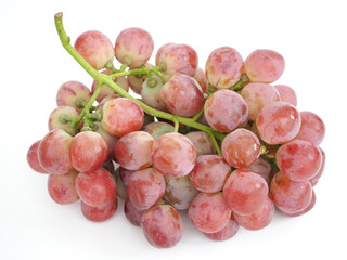 Red fresh grapes on white background.