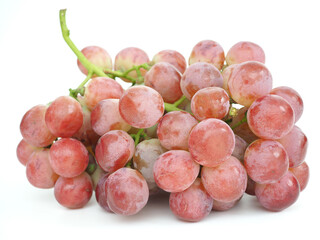 Red grape placed on a white background.