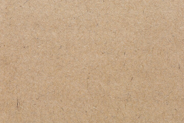 Close up of Old brown paper texture  visible. Paper fibers suitable for use as background images or...