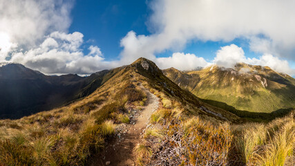 Kepler Track Panorama: Landscape with Mountains and tussock in Fiordland National Park, New Zealand
