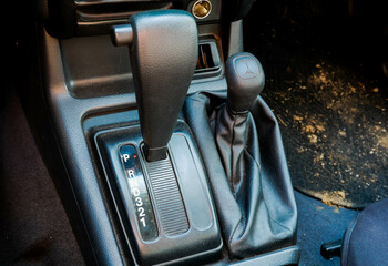 Automatic transmission gearbox and low and high 4 x 4 switch handle on old german car.