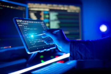 Working atmosphere of a programmer at home, background. Programming code abstract screen