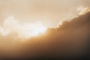 Sun streaming from behind a cloud