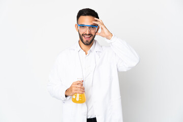 Young scientific man isolated on white background with surprise expression