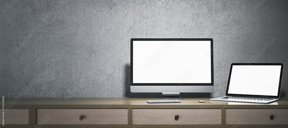 Poster contemporary minimalistic designer office interior with blank white computer and laptop monitors. mo